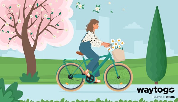 A caricature of a woman riding a bicycle. On the front of her bicycle is a basket with flowers inside. She is riding on a path with different greenery surrounding it. Flowers and leaves are falling around her. A large cherry blossom tree takes up the majority of the left side of the image. In the bottom right corner is the Way to Go a program of DRCOG logo.