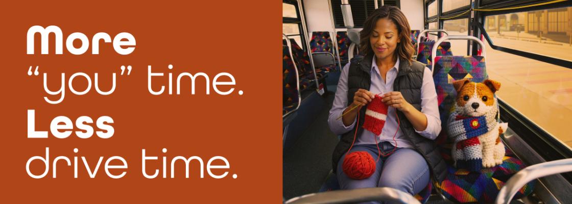 Women knitting sitting next to a knitted puppy toy wearing a Colorado scarf.